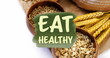 Image of eat healthy text banner against close up of variety of bread and grains