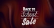 Image of back to school sale over brown and black background