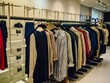 © Madiha - wardrobe with clothes in store