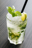 Fototapeta  - Mojito cocktail with lime and mint