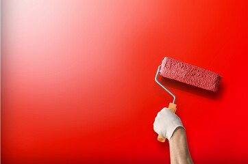 Wall Mural - Painter is painting wall in red color