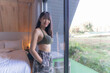 Asian young woman Wear sexy clothes in the bedroom
