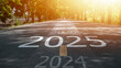 © Thanadon88 - New year 2025 or straight concept. Text 2024, 2025, 2026 written on the road in the middle of the road. Planning concept. Goals. New year 2025 challenge.