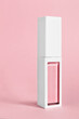Lip gloss on pink background