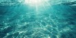 © Ева Поликарпова - Sunlight shining through the clear blue ocean water, ideal for nature and marine themed designs
