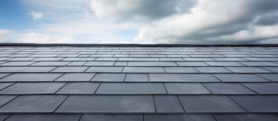 Poster - The image showcases a contemporary rooftop adorned with a charming layer of natural slate Pleasing to the eye the copy space image captures the essence of modern roofing design