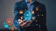 © Wattana - In a dynamic world, a businessman showcases a home model with smart home automation icons, illustrating the seamless integration of technology into everyday environments.