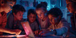 A group of children are looking with interest at a laptop screen in a dark room. Summer IT camp for children