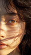 Close up a beautiful black hair Asia woman, sharp shadows cast by the sun. AI Generative
