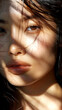 Close up a beautiful black hair Asia woman, sharp shadows cast by the sun. AI Generative