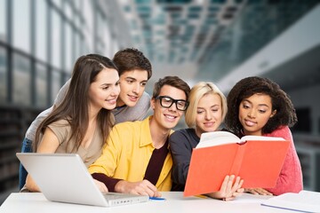 Canvas Print - Happy international young students studying together