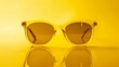 studio photo of yellow sunglasses. summer is approaching concept