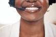 © peopleimages.com - Mouth, person and smile with headphones while working for call center or customer service in office. Black woman, happy and headset for job, career and company as agent with telemarketing pitch