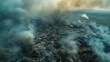 A dramatic aerial view of smoke rising over a devastated landscape, capturing the severity of conflicts in the Middle East