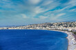 Beach and Promenade des Anglais in Nice town aerial view