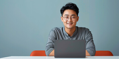 Poster - young Chinese man using laptop