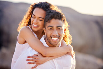 Canvas Print - Portrait, hug and happy couple at beach on holiday, vacation or summer travel outdoor. Face, woman and man piggyback at ocean for adventure date, love or connection for healthy relationship together