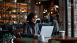 © yafi4 - Muslim women enjoying a productive day at the cafe with my laptop and coffee, work life hijab style