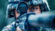 © Naknakhone - Close up of American soldier keeping sight on modern gun. copy space for text.