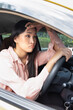 Sad unhappy upset woman driver driving with negative emotion, concept image for high gasoline oil price, traffic jam, broken car, traffic bill, taxi app problem