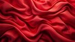 Red crumpled silk fabric, wrinkled cloth backdrop.