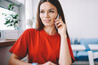 © BullRun - Attractive hipster girl with brunette hair communicated with customer service for consultancy using 4g connection on modern smartphone device, positive charming woman talking with friend via cellphone