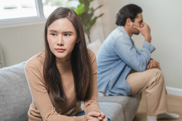 Wall Mural - Breakup and depressed, asian young quarrel couple love fight relationship in trouble. Different people are emotion angry. Argue wife has expression upset with husband. Problem of family people.