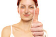 portrait of a young woman with red hair showing thumb up on white background