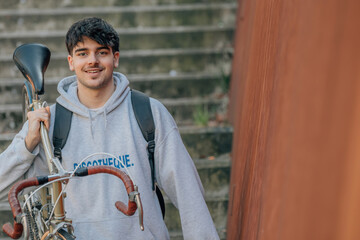 Poster - student carrying the bicycle