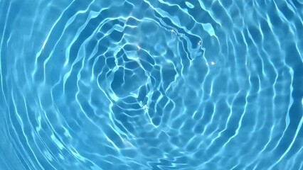 Wall Mural - Slow motion of blue water wave reflection ripples. flowing ripples in slow motion. 4K shot for cosmetic and design advertising