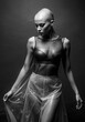 Bald Woman with  in transparent plastic wear. Beautiful Sexy Girl black and white portrait