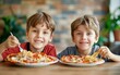 Two boys enjoying a hearty meal of pizza and spaghetti.