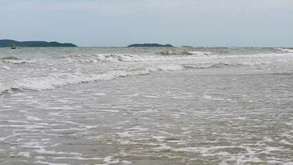 Wall Mural - color of sea water, height and wave strength, summer is an early sign of monsoons