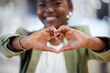 © peopleimages.com - Black woman, hands and heart for love, small business and gesture for motivation and unity. Creative, company and emoji for support of local, employee and female person for mindset and happiness
