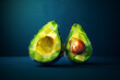 A pair of avocado by glowing low polygonal on dark blue background