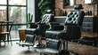 Beauty salon barbershop interior. Large comfortable black leather armchairs in a modern, cozy and bright room..