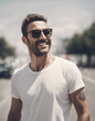 © abu - Portrait of happy man in white t-shirt and wearing sunglasses, isolated on white background