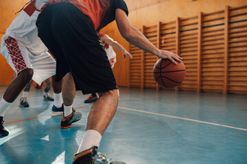 Wall Mural - Rear view of an professional diverse players training basketball together