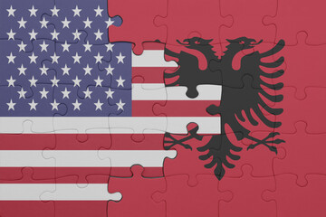 Wall Mural - puzzle with the colourful national flag of albania and flag of united states of america .