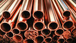 Metal copper pipes of different diameters industrial background close-up