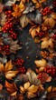 Autumn Leaves and Red Berries on a Dark Textured Background: Seasonal Nature Display.