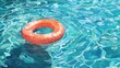 © AkuAku - A bright rubber ring lazily drifts in the cool cerulean waters of a sun kissed swimming pool embodying the carefree essence of Summer Reflections