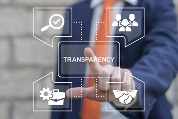 business man working on virtual touch screen presses word: transparency. business transparency and a