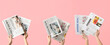 © Pixel-Shot - Women with newspapers on pink background