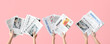 © Pixel-Shot - Women with newspapers on pink background