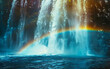 © AhmadTriwahyuutomo - Focus on the delicate beauty of a rainbow arching over a waterfall