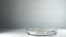 Round Transparent Glass Plate On White Background.