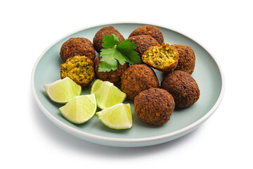 Wall Mural - Plate with delicious falafel balls and lime on white background