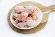 © Bowonpat - Fresh raw chicken wings (wingstick)