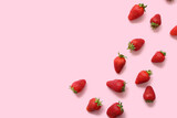 Sweet fresh strawberries on pink background